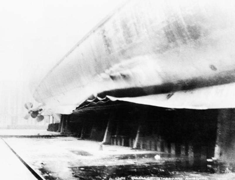 HMS Belfast (C35) damage to hull by a mine