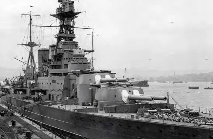 HMS Hood alongside
