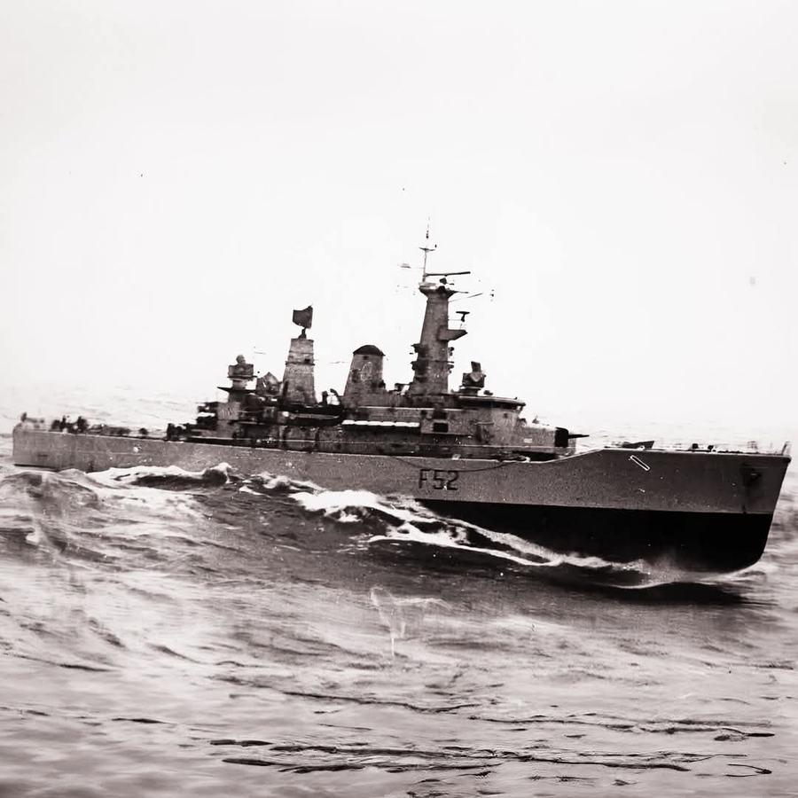 HMS Juno (F52) is shown navigating through heavy swell circa 1978, as seen from the Soviet landing ship Ivan Rogov